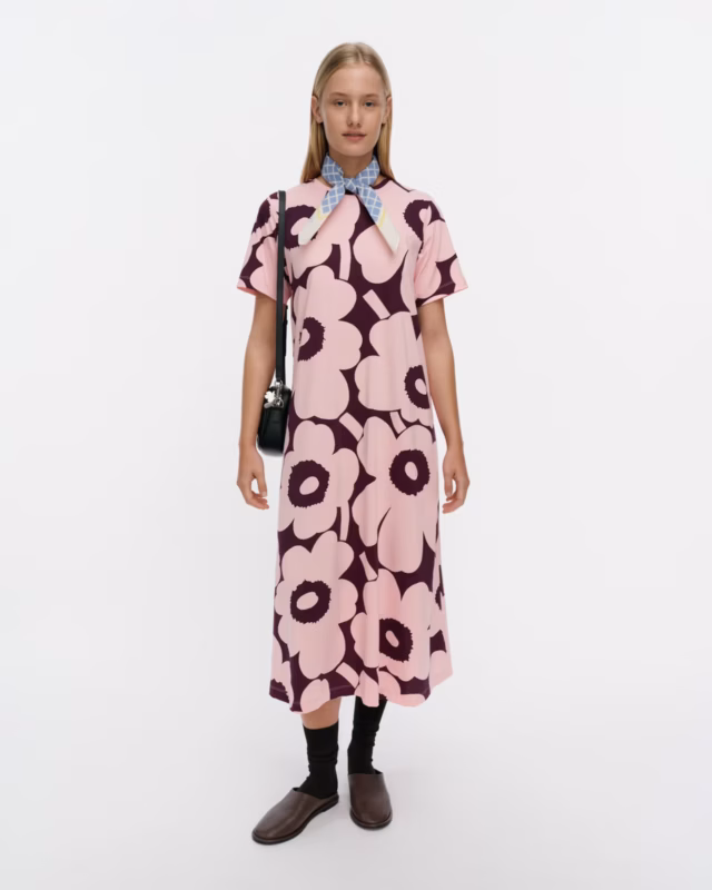 model wearing marimekko Pisteinen Unikko dress in light pink